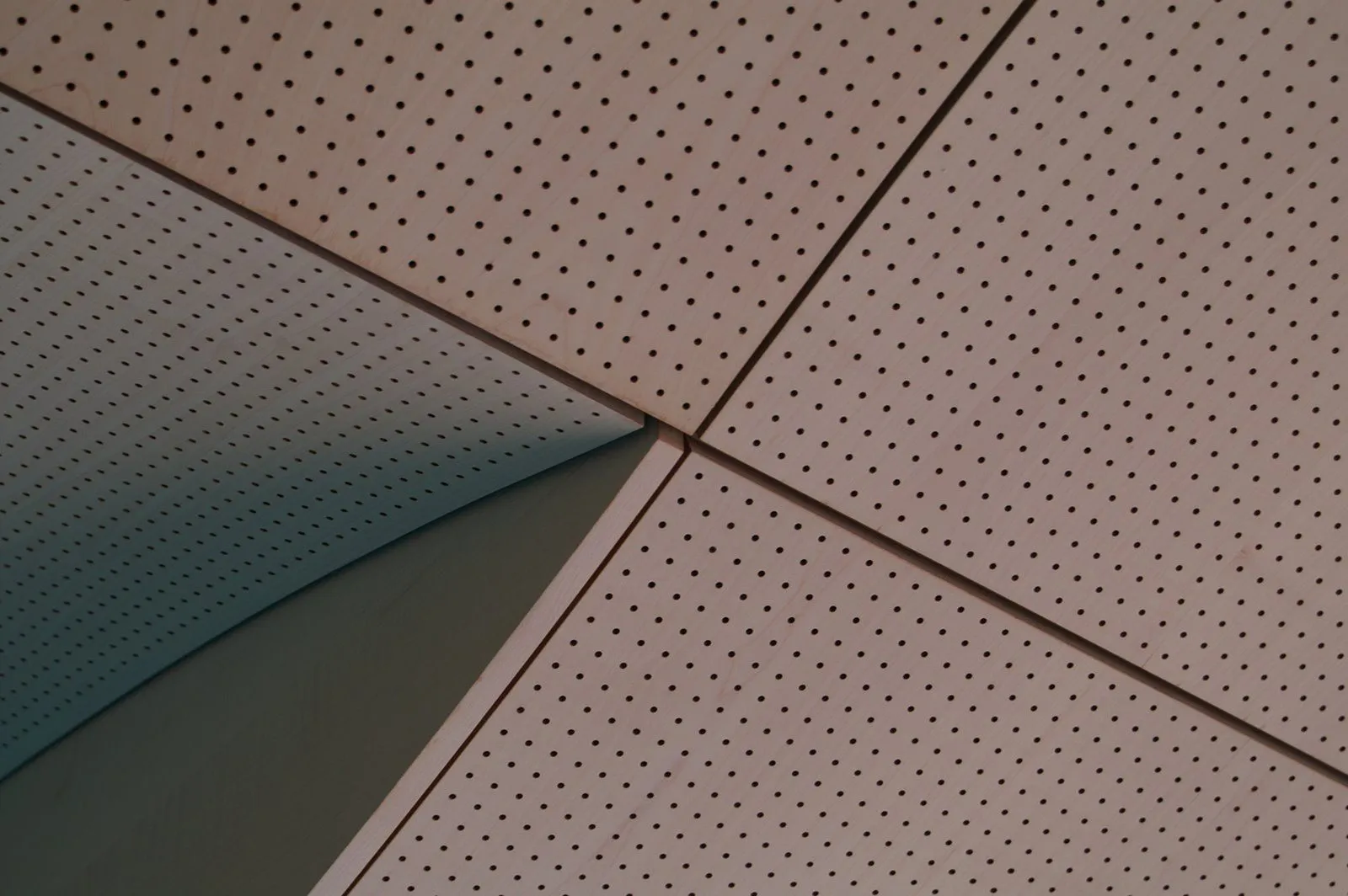 Indoor pool with timber acoustic ceiling panels