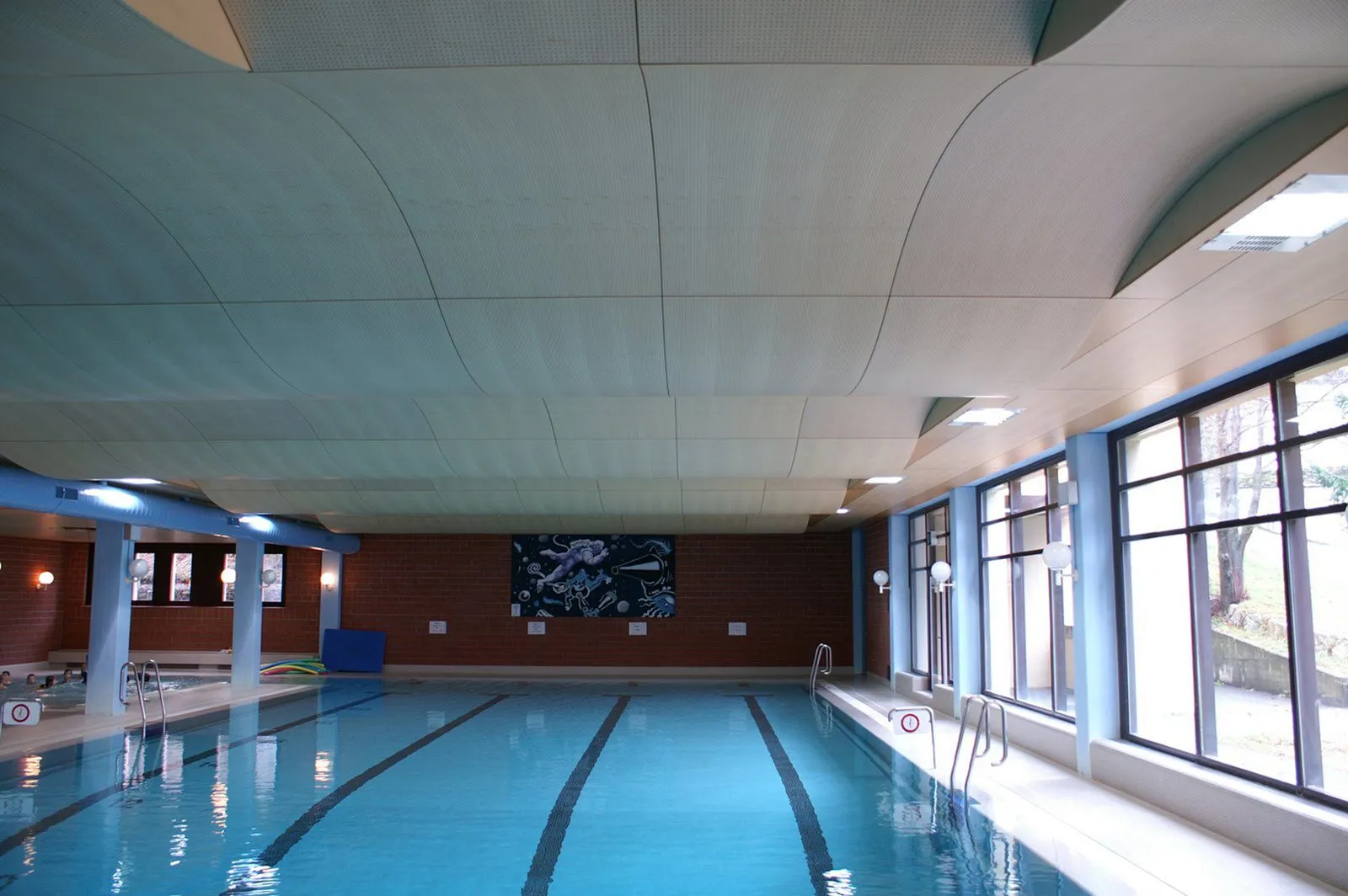 Hotel Albrici indoor pool and timber acoustic ceiling