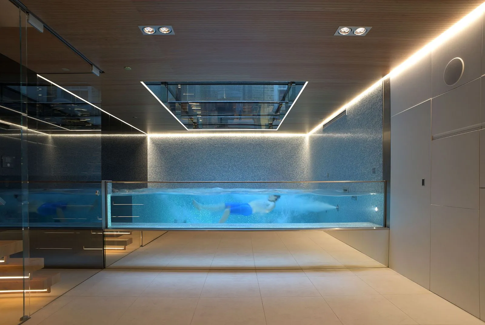 Infinity House indoor pool beneath a timber acoustic ceiling
