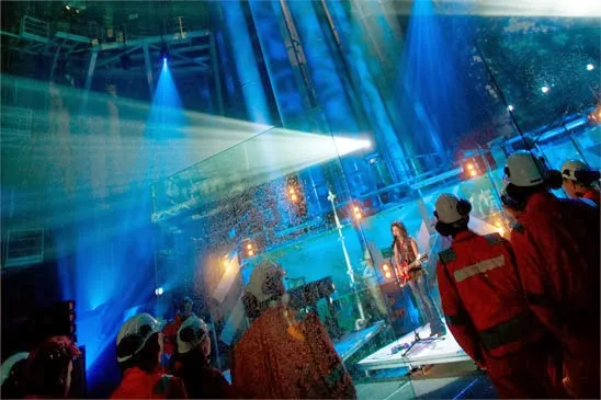 Singer Katie Melua performs on an oil rig.